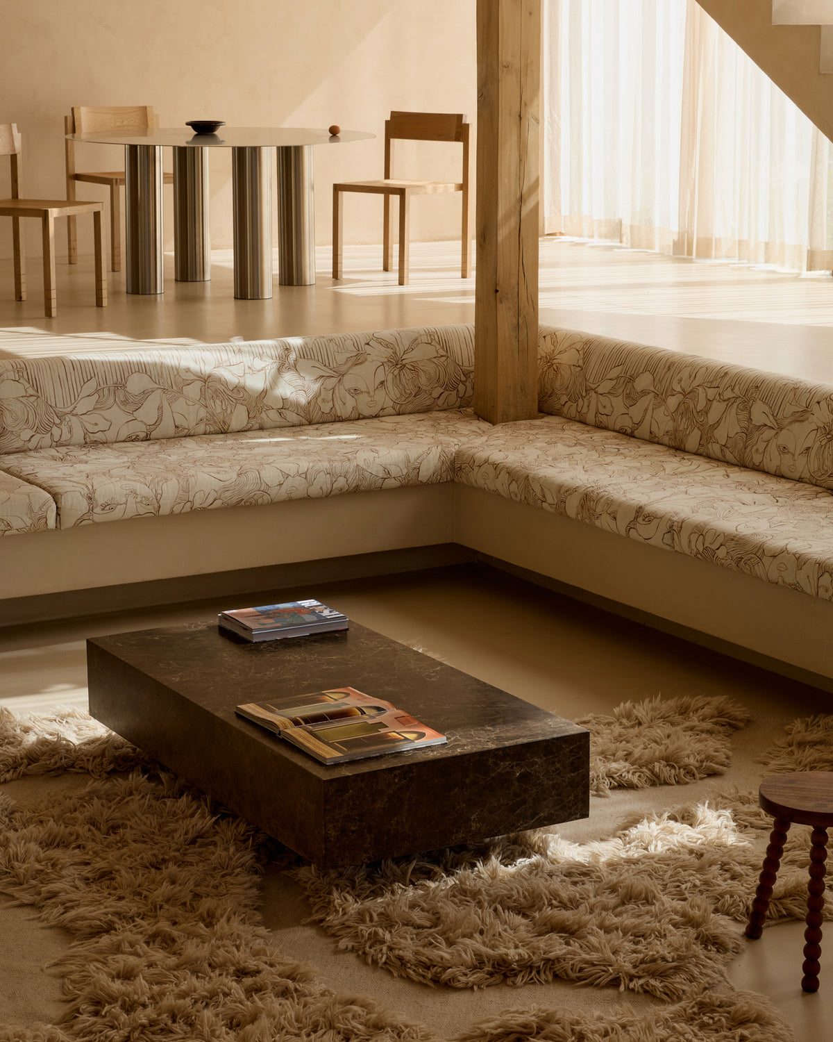 Chocolate marble coffee table styled in a living room