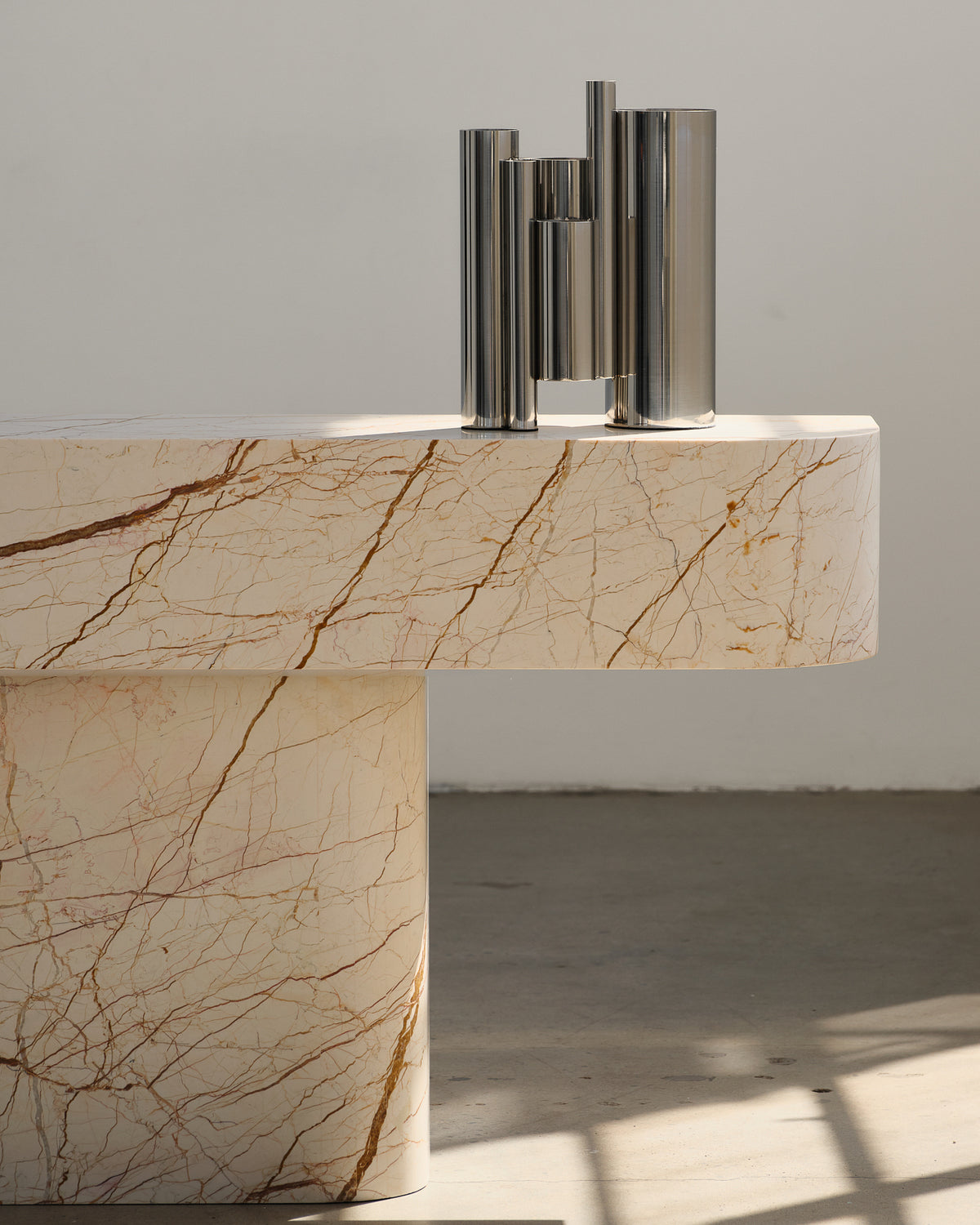 Honeycomb marble console table and vase