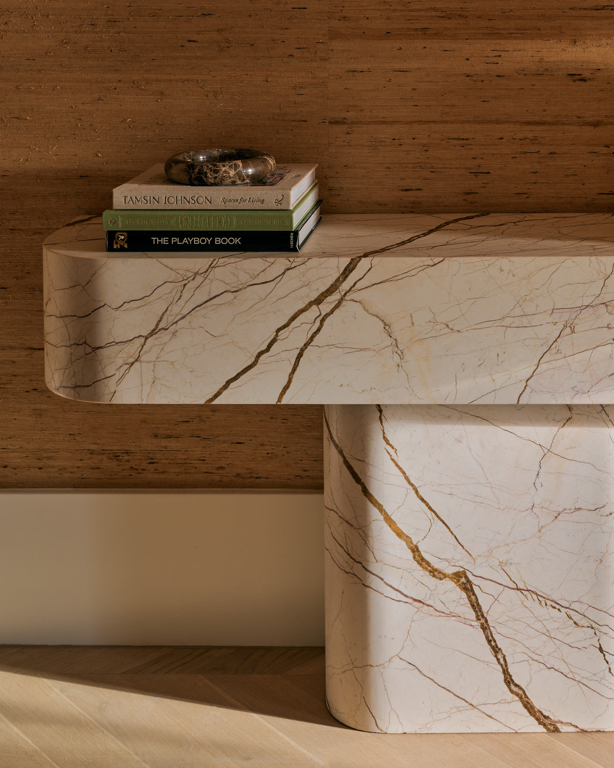 Honeycomb marble console table styled