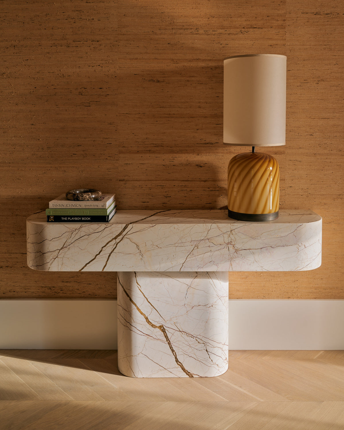 Honeycomb marble console table styled