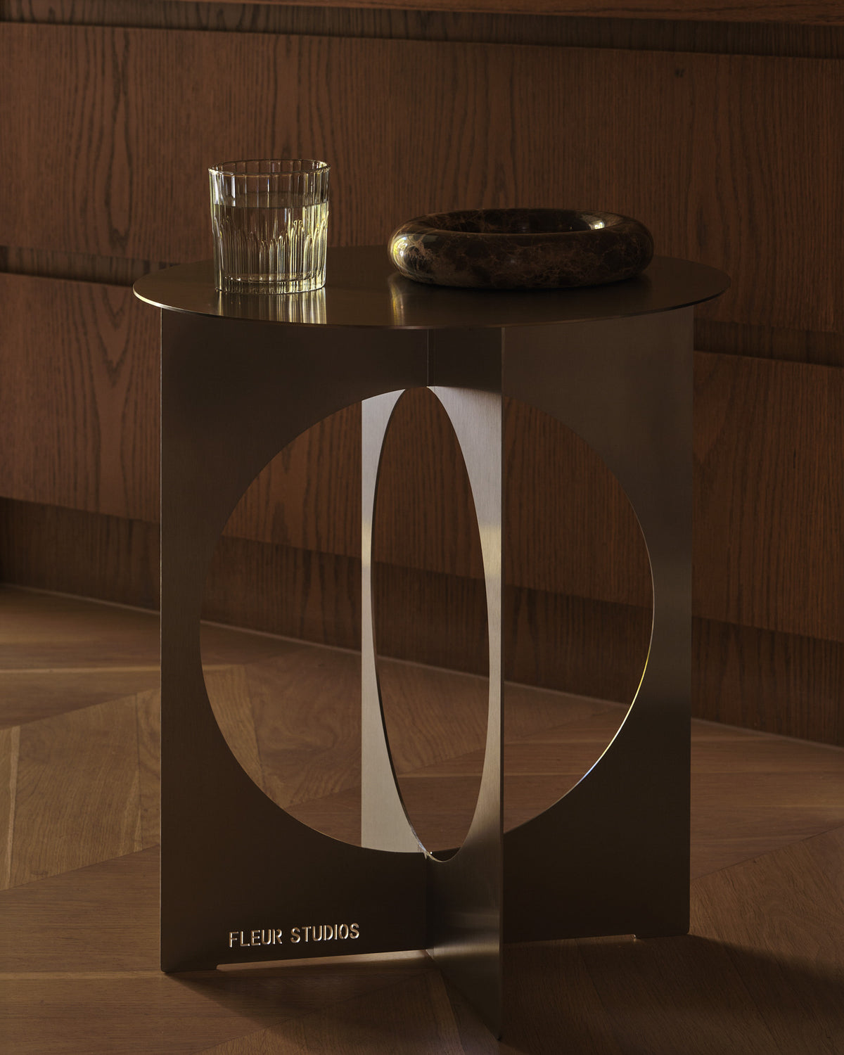 Modern stainless steel side table.