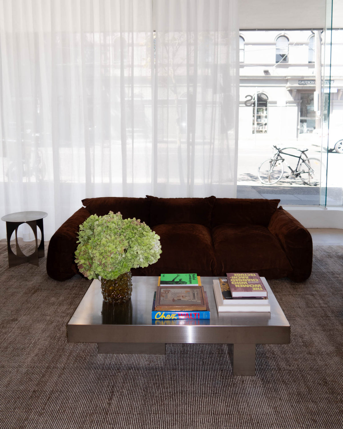 Modern stainless steel coffee table styled.