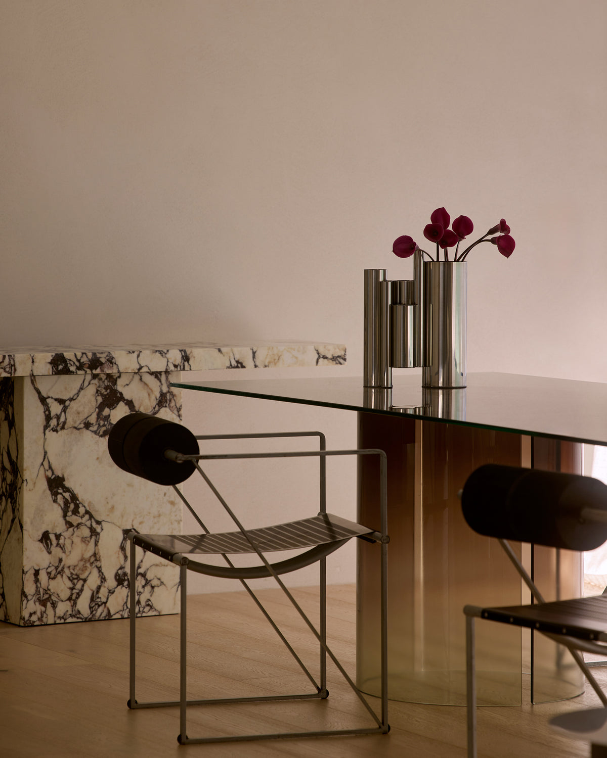 Stainless steel vase styled on a dining table