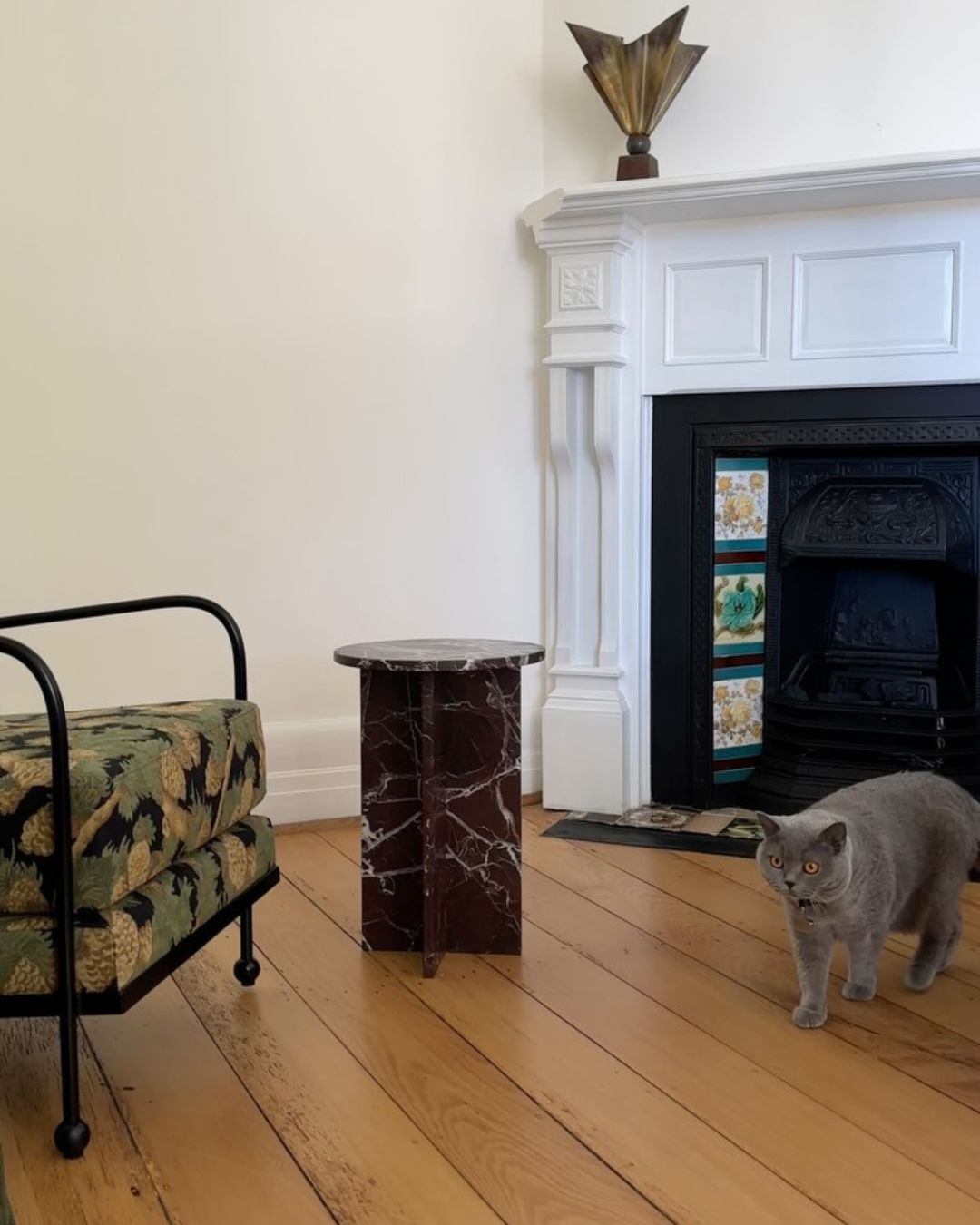 Rosa levanto marble side table in a living room