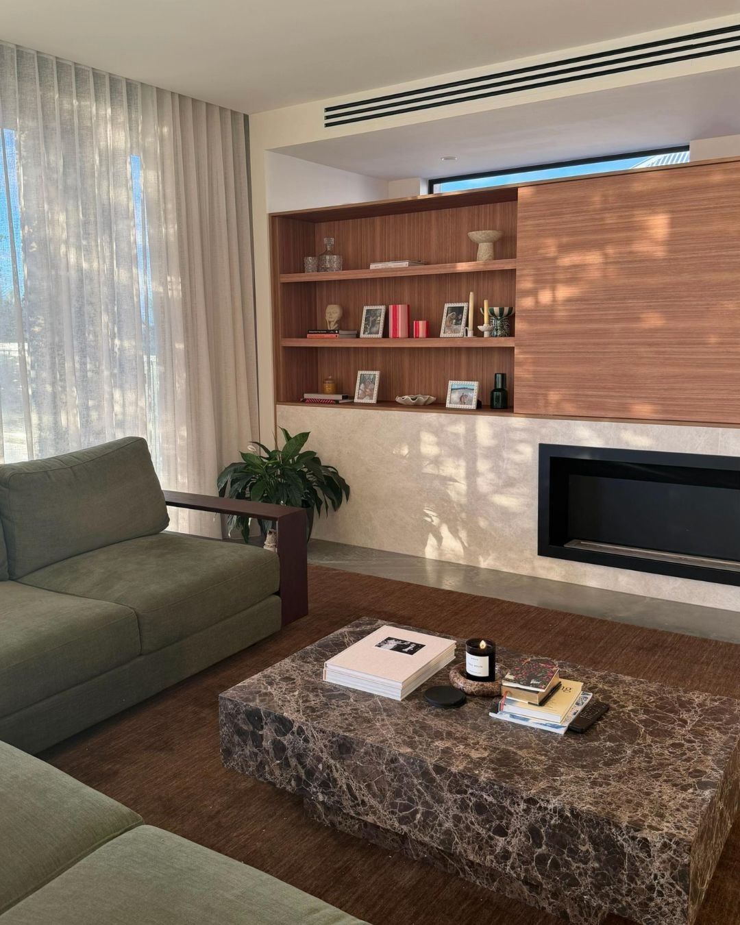 Living room styled with a chocolate marble coffee table