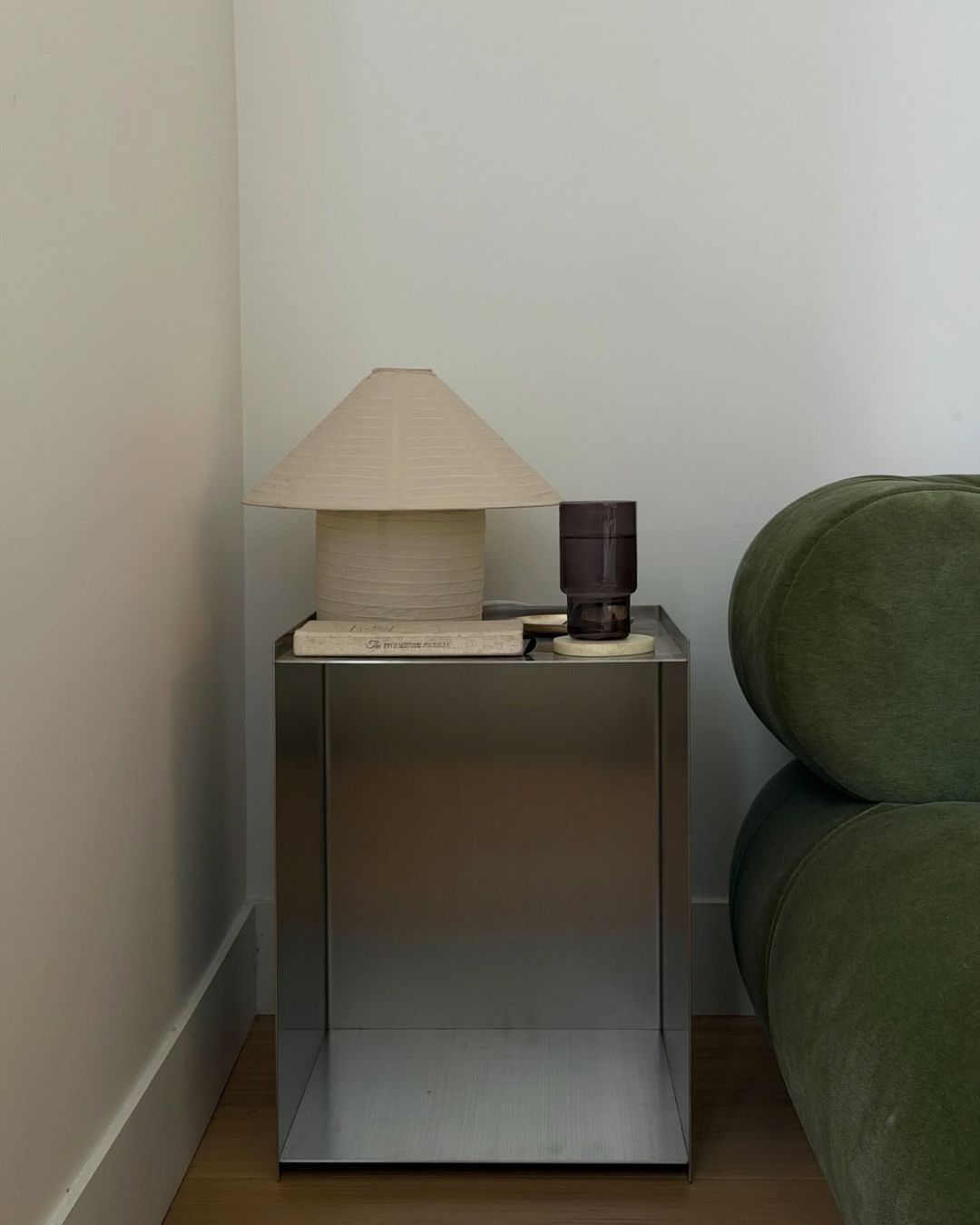 Stainless steel bedside table styled
