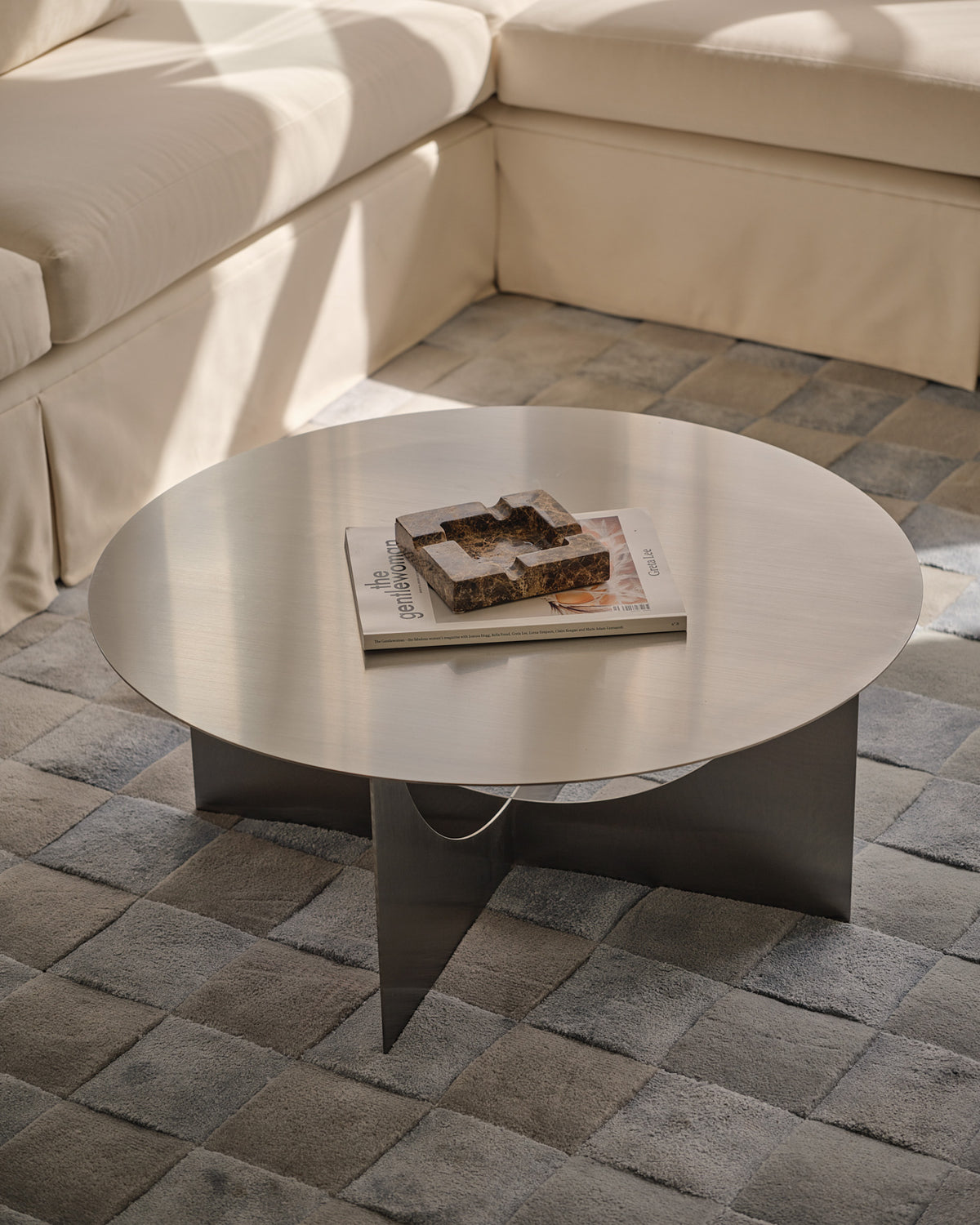Stainless steel coffee table styled.