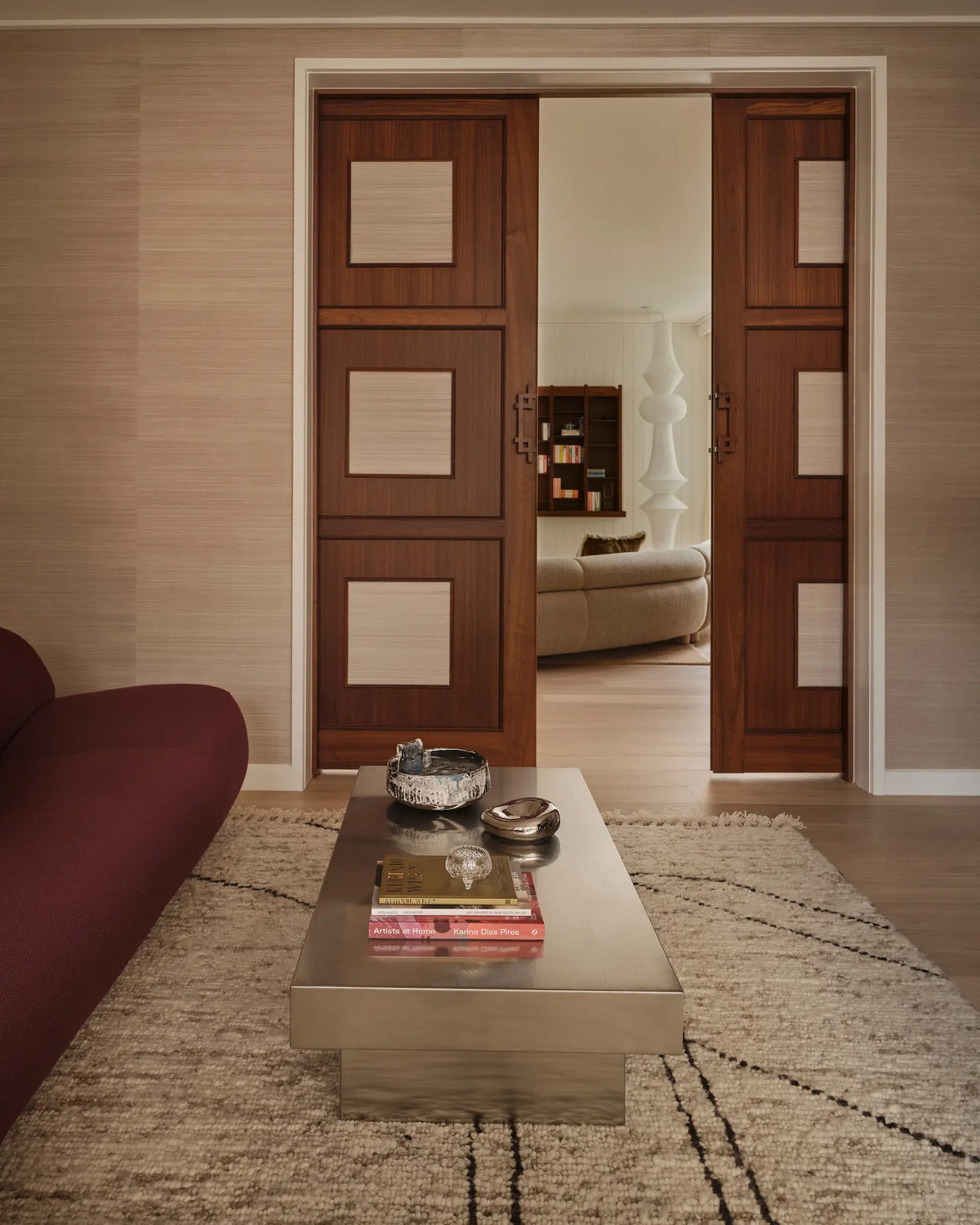 Stainless steel coffee table styled in a living room