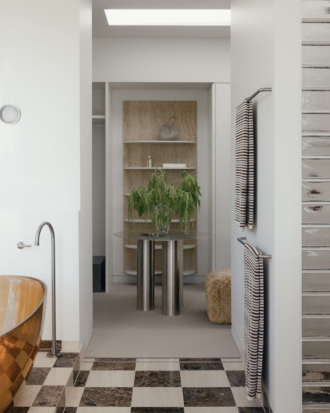 Stainless steel table styled in a bathroom
