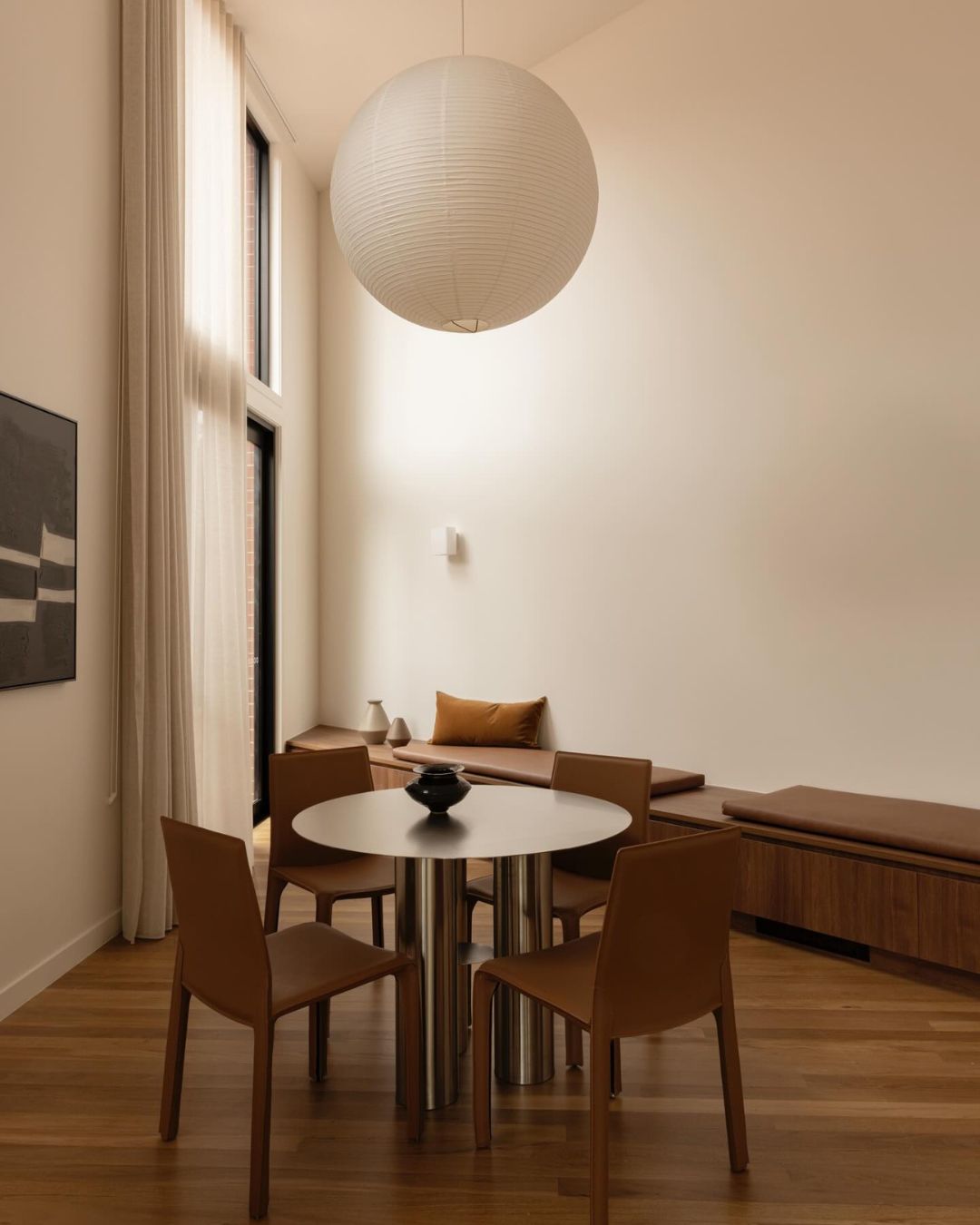 Stainless steel dining table styled in a dining room