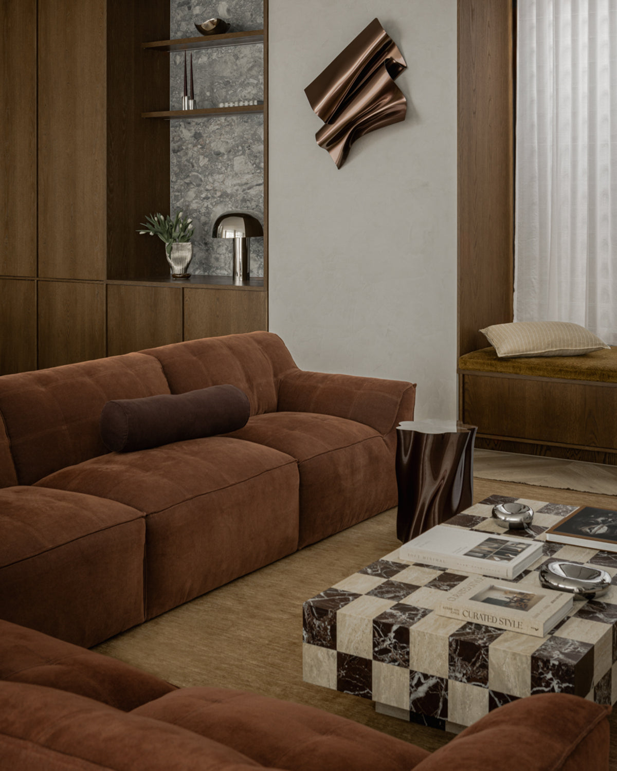 A marble checkered coffee table styled in a living room