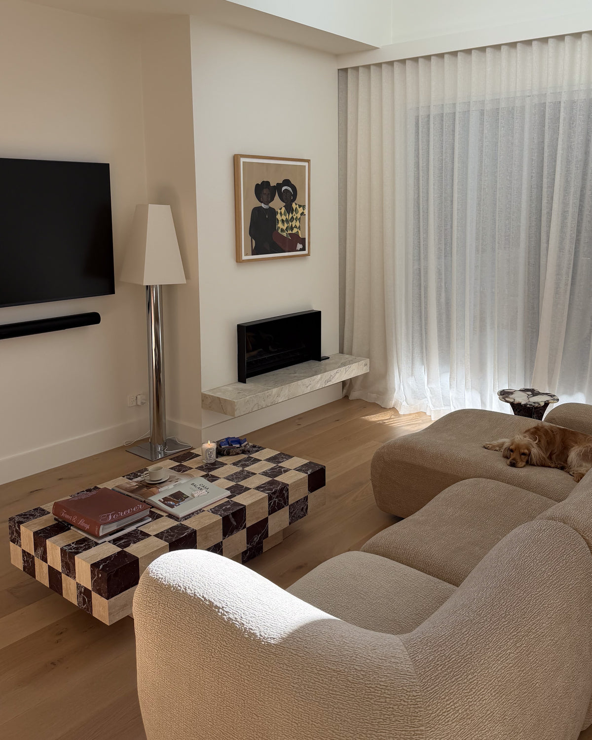 Living room featuring a checkered marble coffee table
