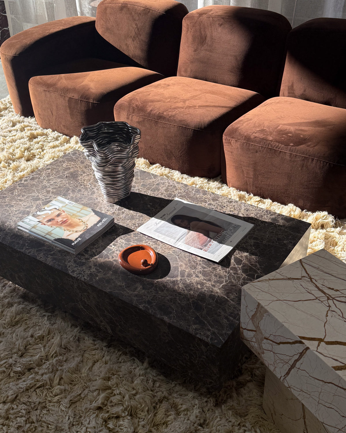 Living room styled with a marble coffee table