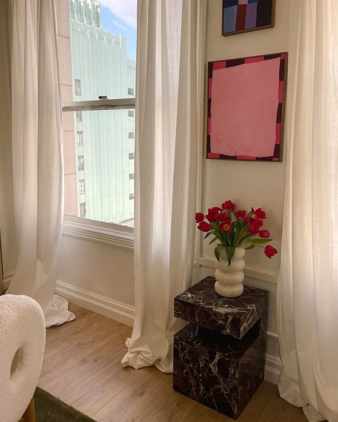 Rosa levanto marble side table styled in a bedroom