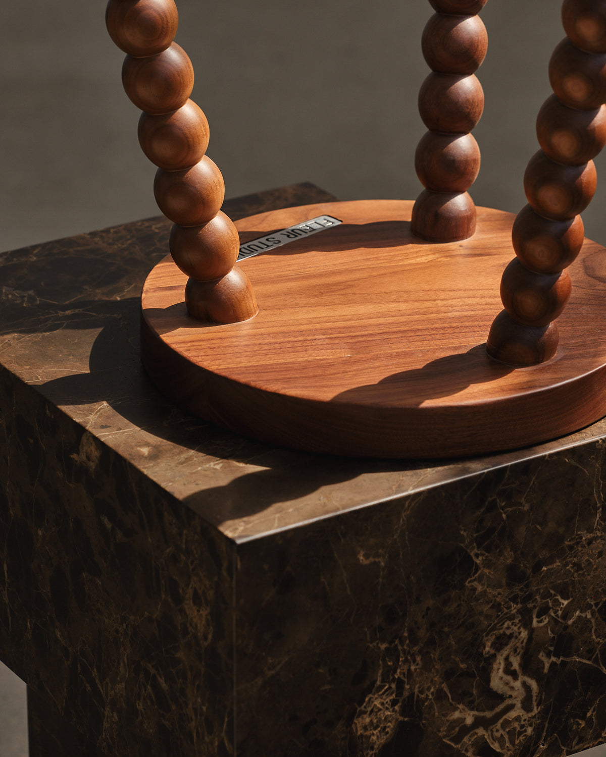 Small wooden walnut stool