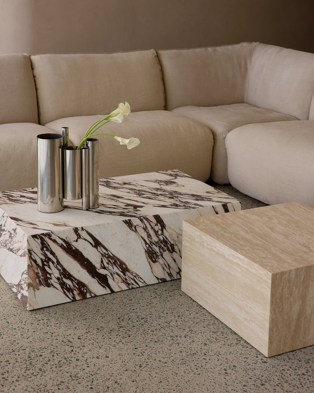 Stainless steel vase on a coffee table