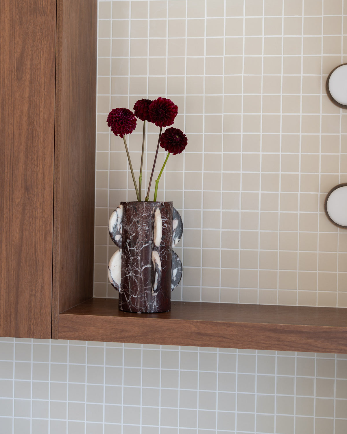A cylindrical marble vase