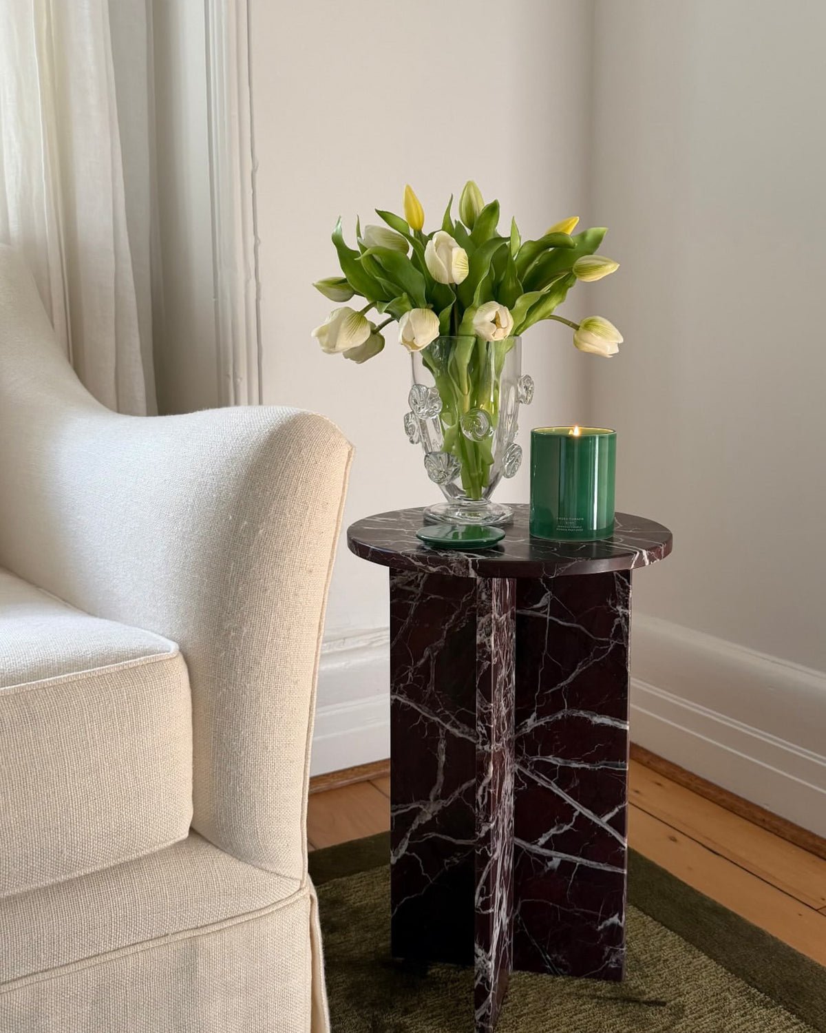 Rosa levanto marble side table in a living room