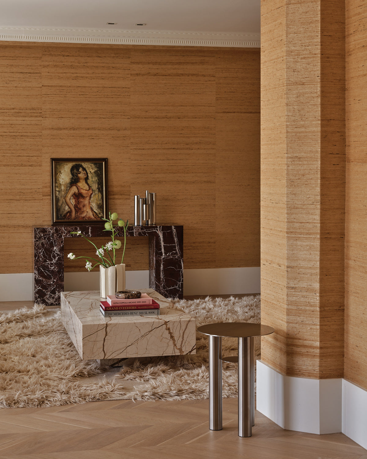 Honeycomb marble coffee table styled in a living room