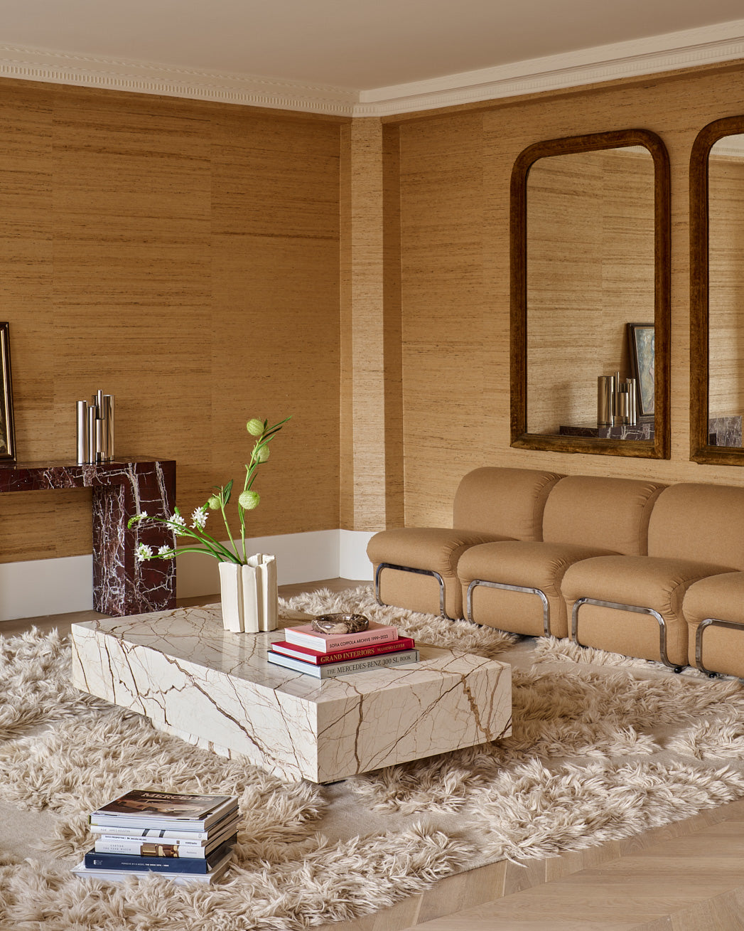Honeycomb marble coffee table styled in a living room