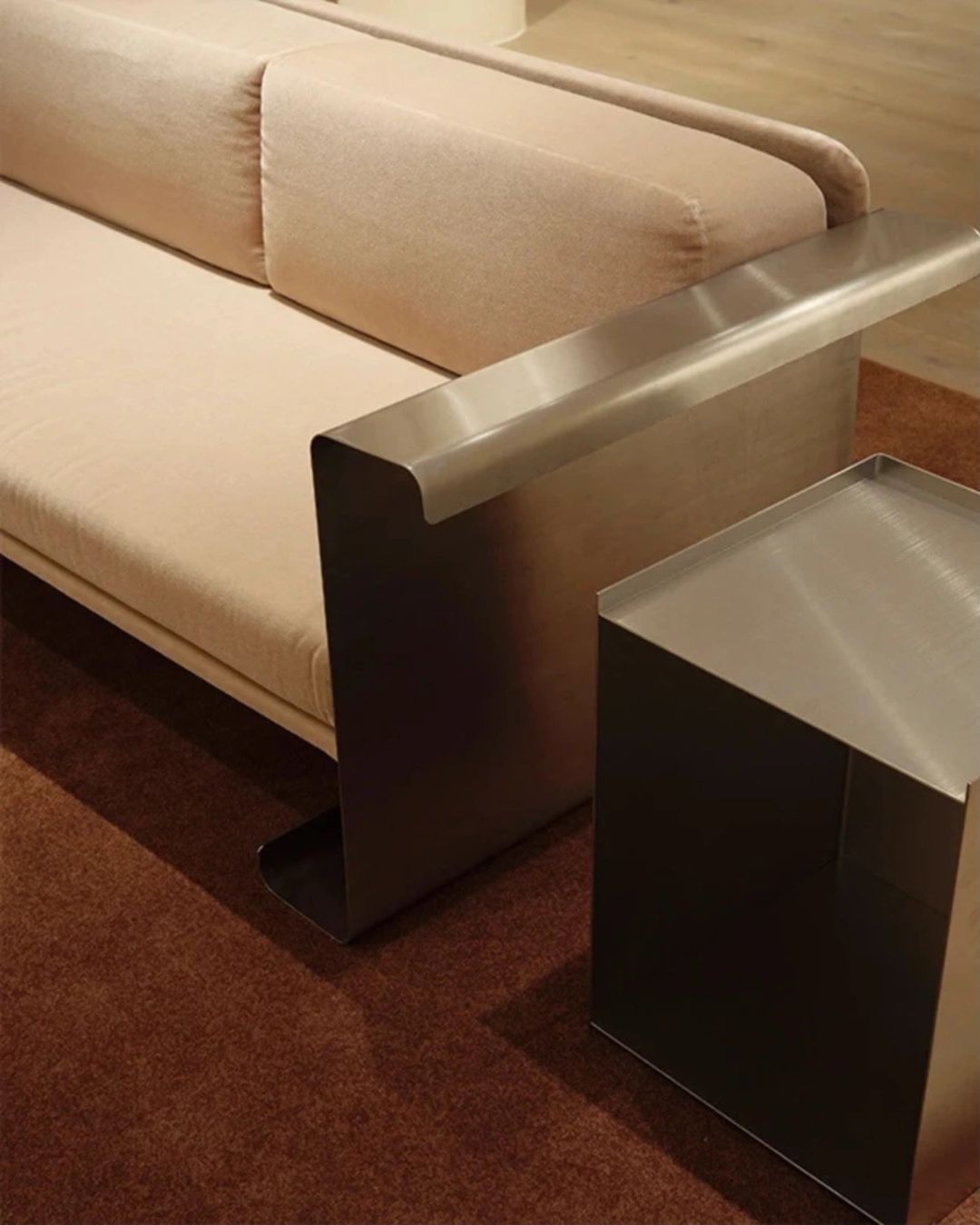 Sofa and a stainless steel side table