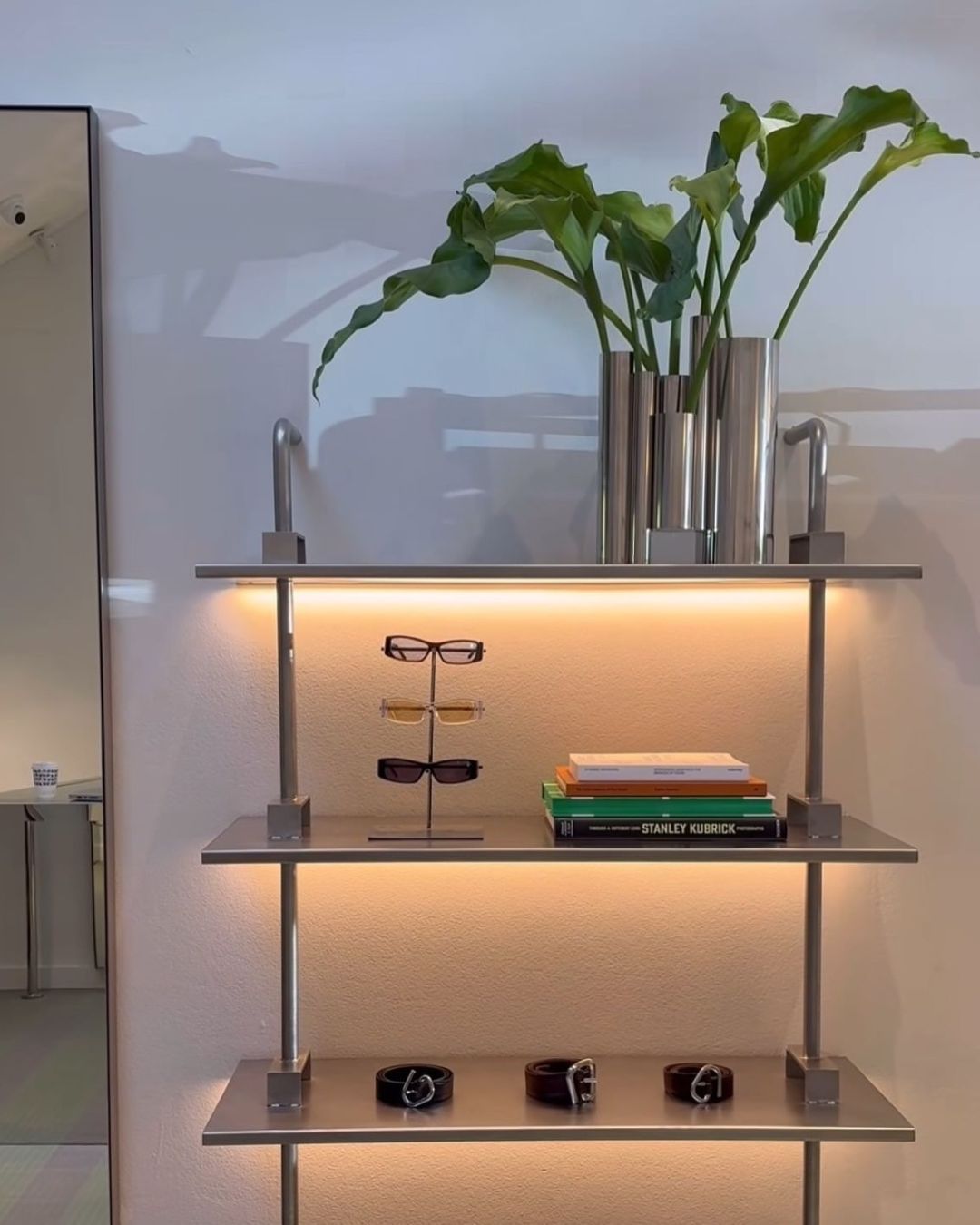 Stainless steel shelving and vase
