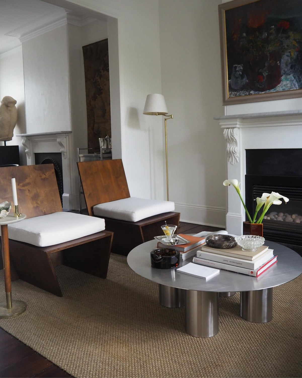 Living room with a round stainless steel coffee table