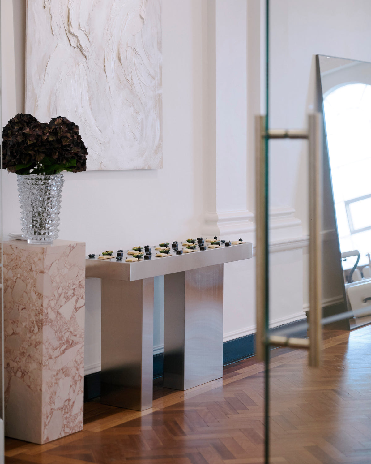 Stainless steel console table styled