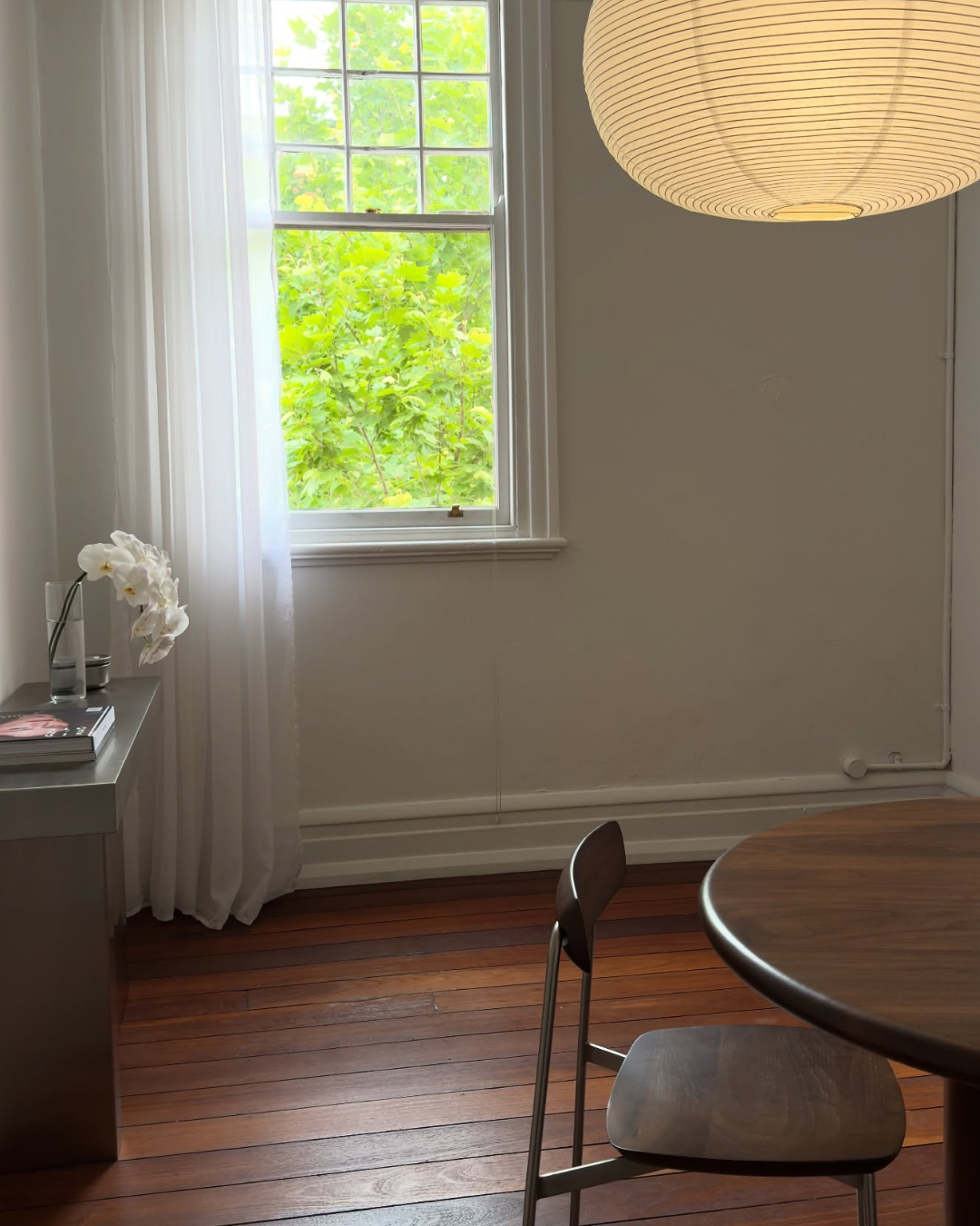 Stainless steel console styled in a dining room