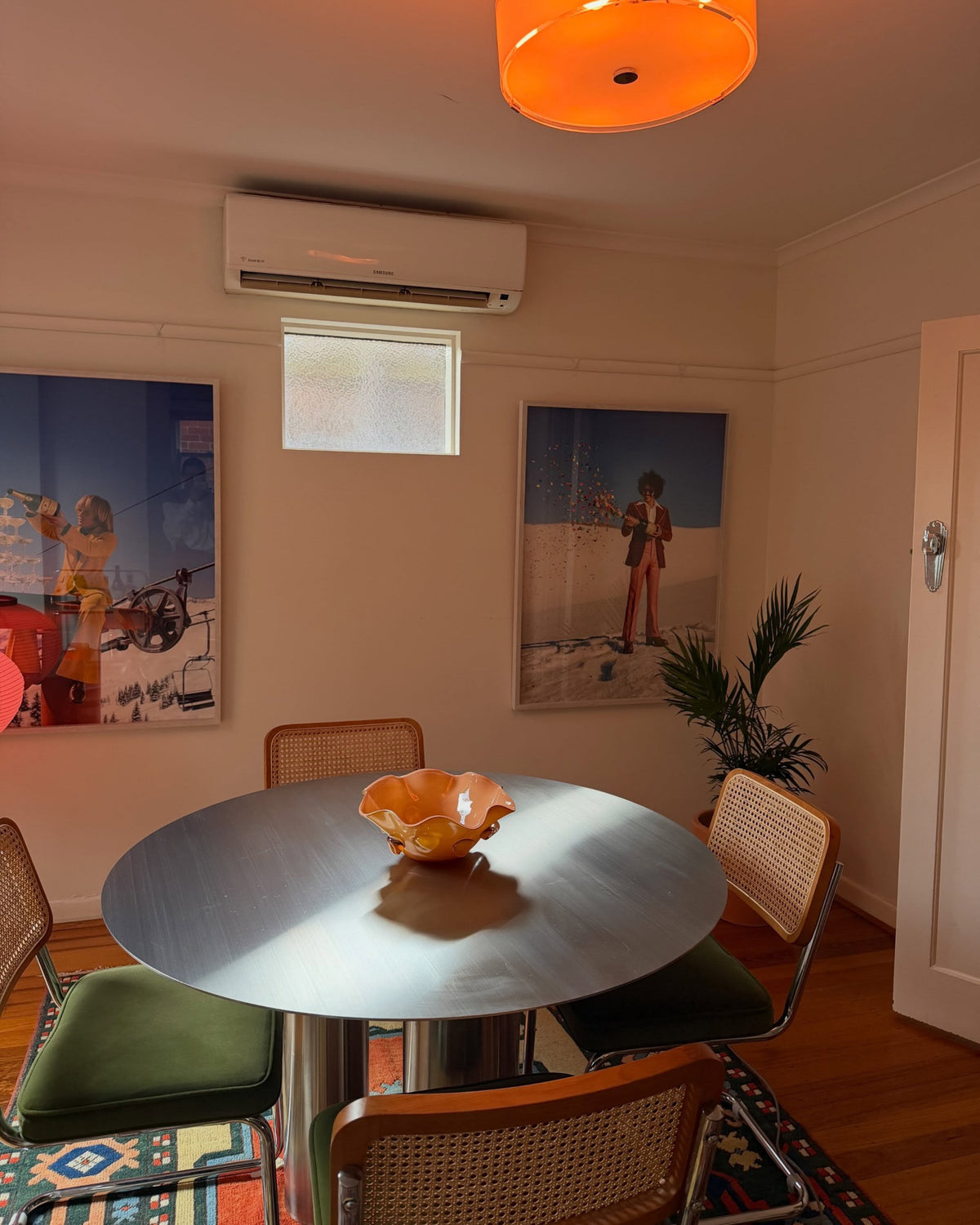 Stainless steel dining table styled in a dining room
