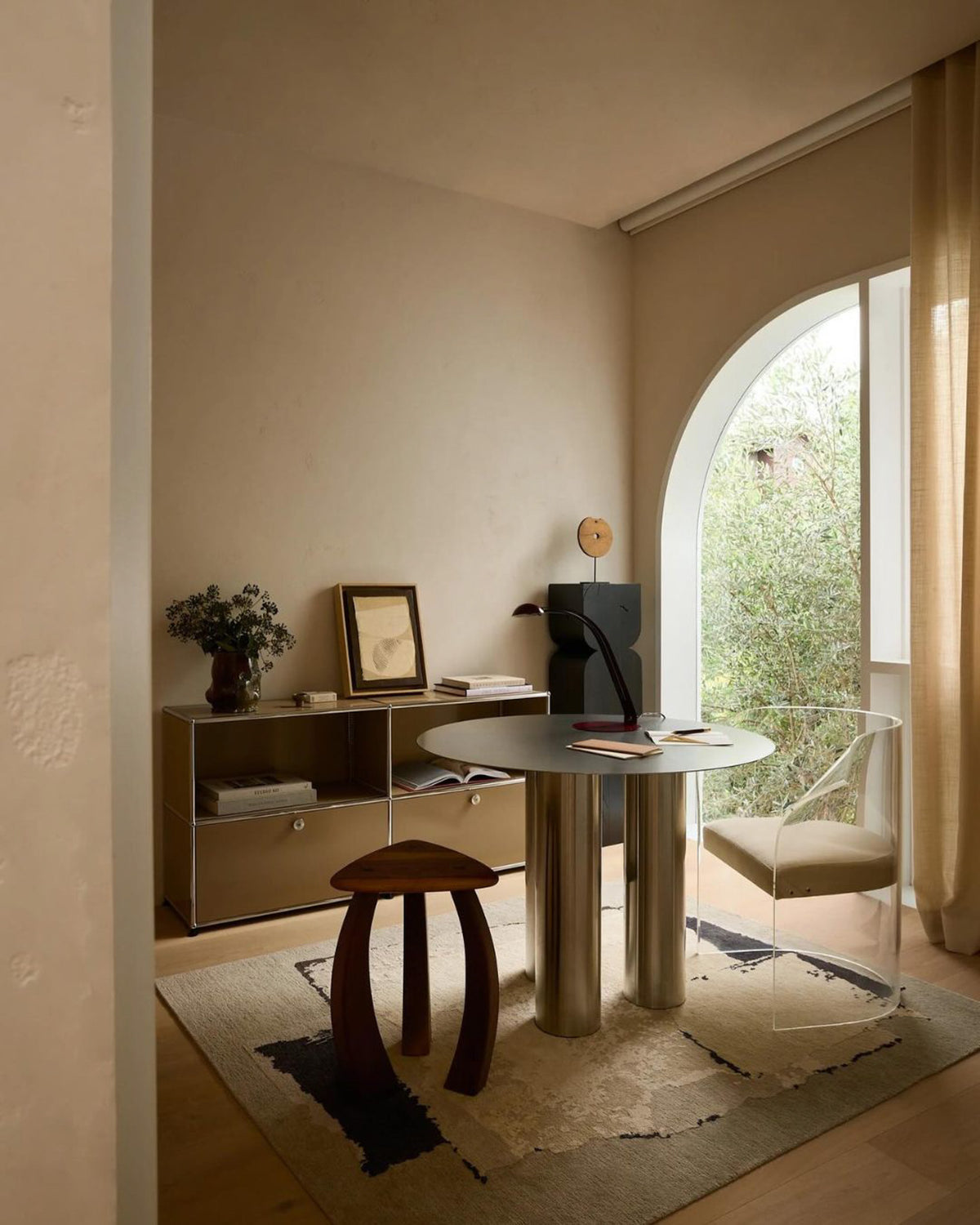 Stainless steel table styled in a study