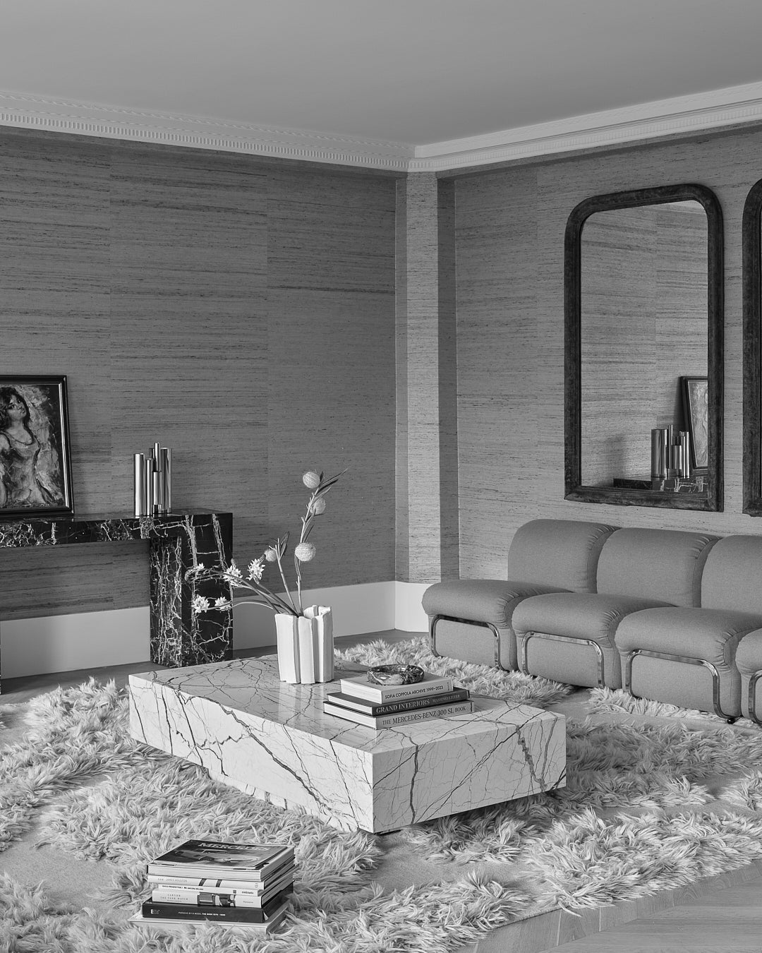 Honeycomb marble coffee table styled in a living room