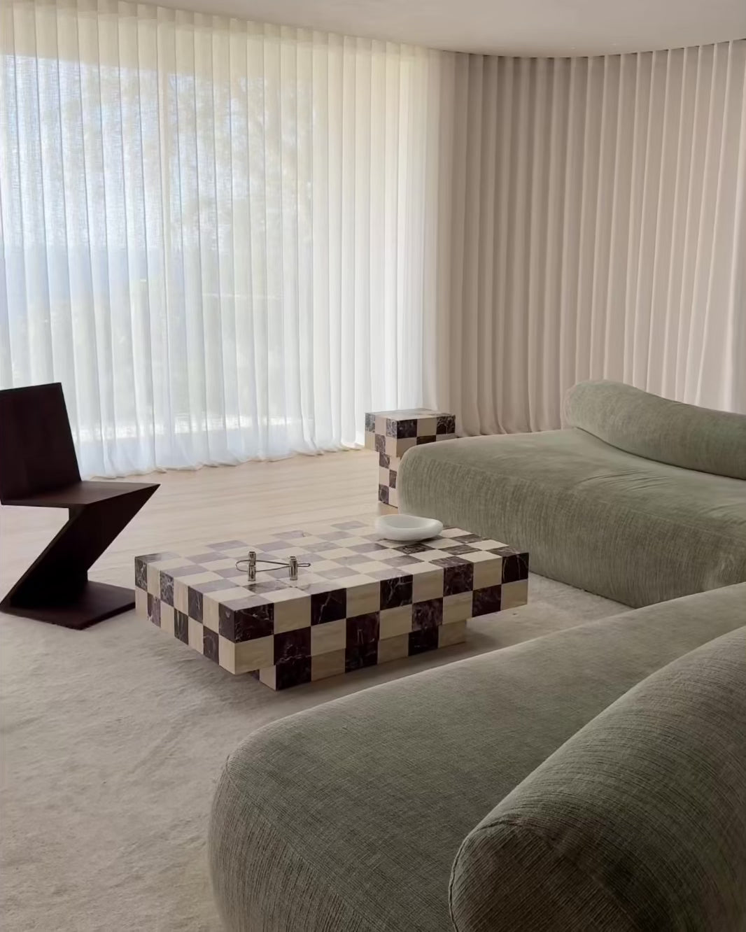 A modern checkered coffee table styled in a living room