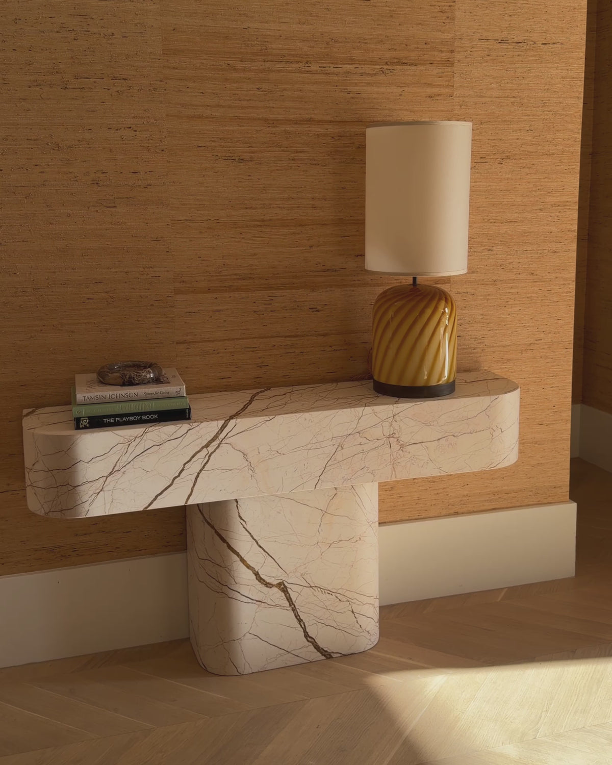 Honeycomb marble console table styled